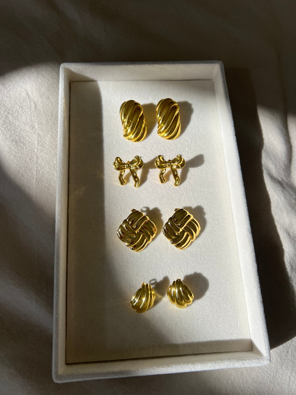 Pendientes shell glow